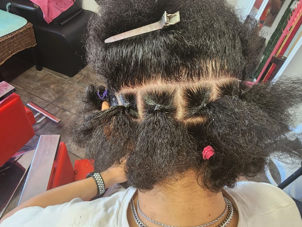 Beautiful locs maintenance hairstyle - East Tucson salon