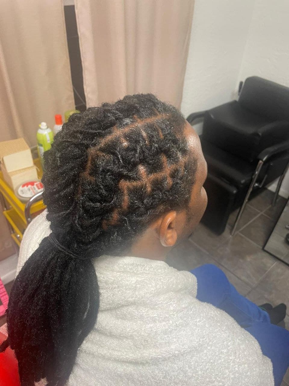 Professional locs retwist for natural hair in Tucson AZ