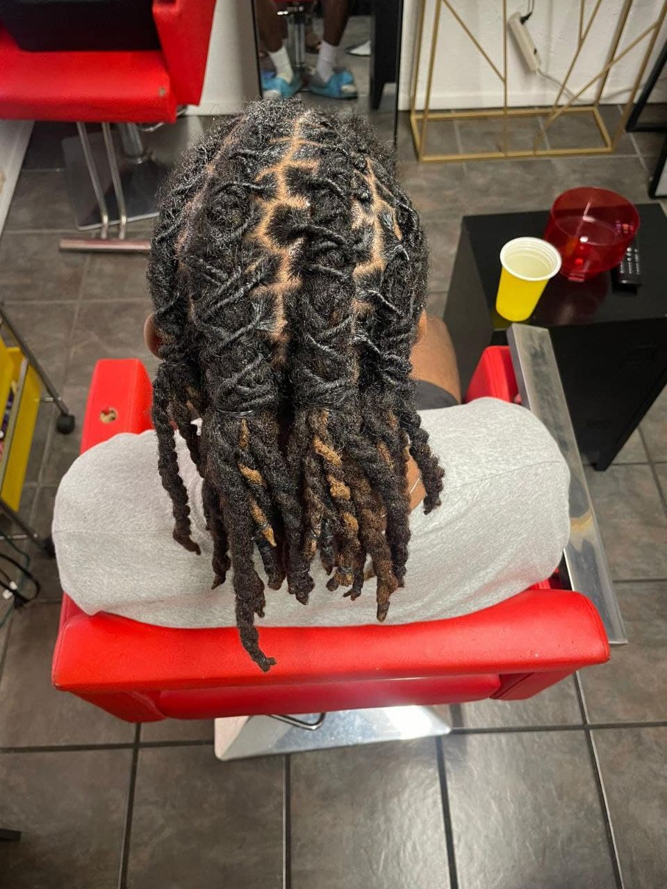 Professional locs styling for natural hair in Tucson AZ