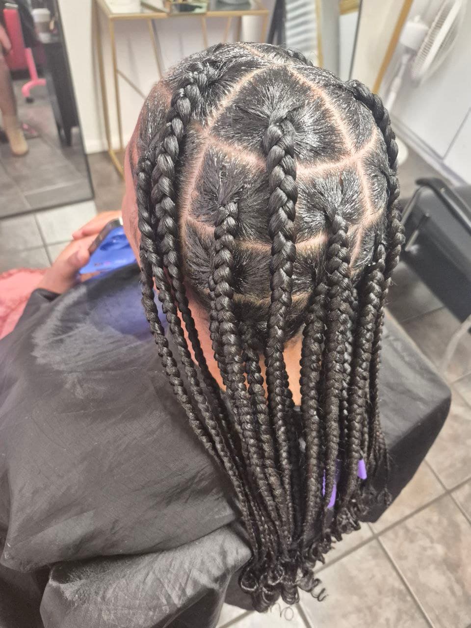 Professional jumbo box braids for natural hair in Tucson AZ
